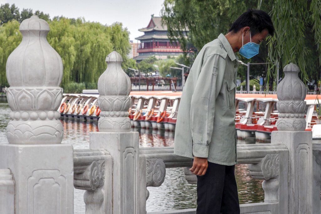 APTOPIX Virus Outbreak China Daily Life